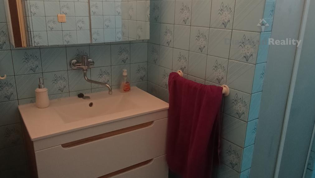 Priestranný rodinný dom s garážou, dielňou a krásnym zázemím v obci Veľké Chrašťany – Beladice
