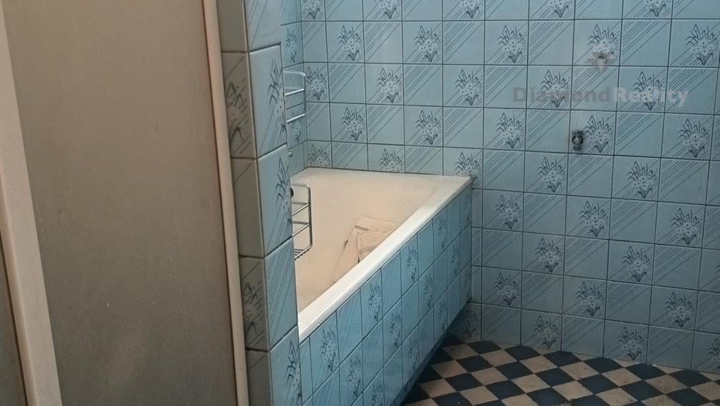 Priestranný rodinný dom s garážou, dielňou a krásnym zázemím v obci Veľké Chrašťany – Beladice