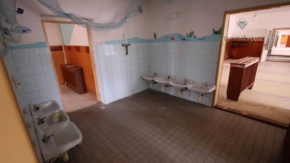 Na predaj stavebný pozemok v centre obce Mojzesovo